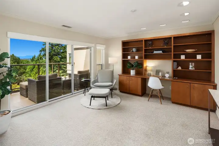 Large office/den with built-ins and private view deck