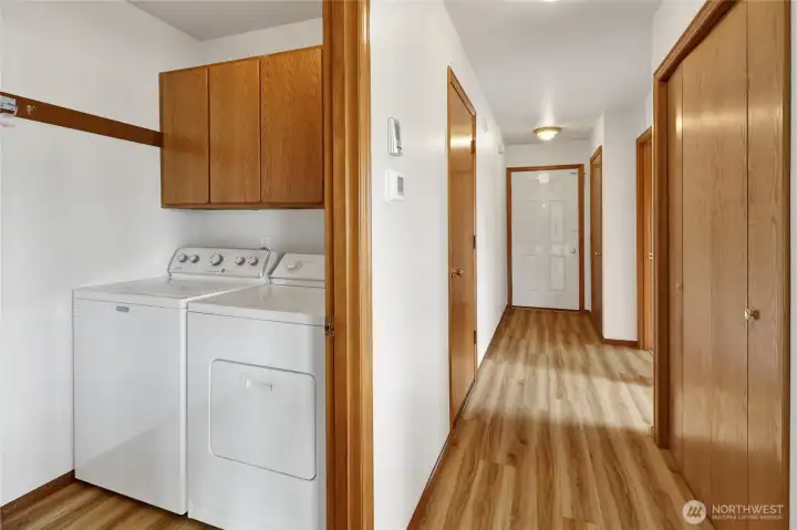 The laundry room is conveniently located between the two bedrooms just off the kitchen. The laundry room is conveniently located between the two bedrooms just off the kitchen.