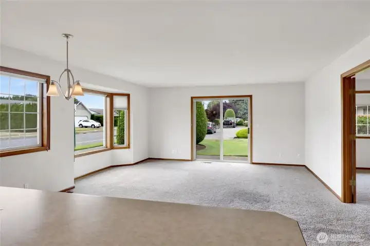 Whether you're hosting a crowd or enjoying a quiet evening, the spacious living room has room for it all. Whether you're hosting a crowd or enjoying a quiet evening, the spacious living room has room for it all.