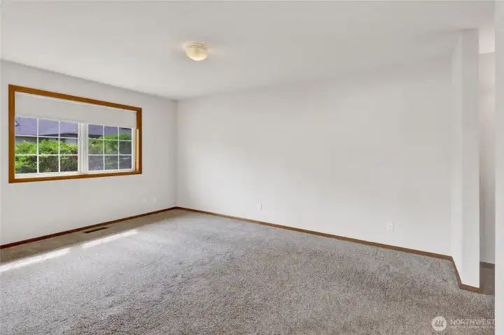 Retreat to the comfortable primary bedroom, complete with an ensuite bath and walk-in closet. Retreat to the comfortable primary bedroom, complete with an ensuite bath and walk-in closet.