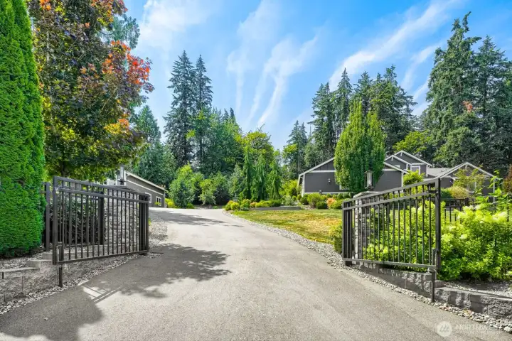 Beautiful gated entry welcomes you to this custom built gorgeous etstate on 1.77 professionally landscaped acres. Beautiful gated entry welcomes you to this custom built gorgeous etstate on 1.77 professionally landscaped acres.