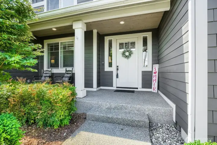 Front entrance w/ a covered patio. Great for relaxing and enjoyin the beautiful yard. Front entrance w/ a covered patio. Great for relaxing and enjoyin the beautiful yard.