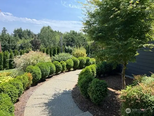 Landscaped walkway from the front door. Landscaped walkway from the front door.