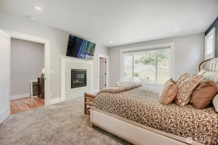 1st Primary BR on the main floor complete with gas fireplace & a 5 suite bathroom. & walk-in-closet, 1st Primary BR on the main floor complete with gas fireplace & a 5 suite bathroom. & walk-in-closet,