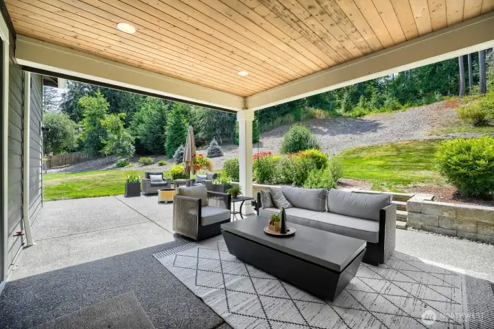 One section of the big back patio. This section is covered for year round enjoyment. One section of the big back patio. This section is covered for year round enjoyment.
