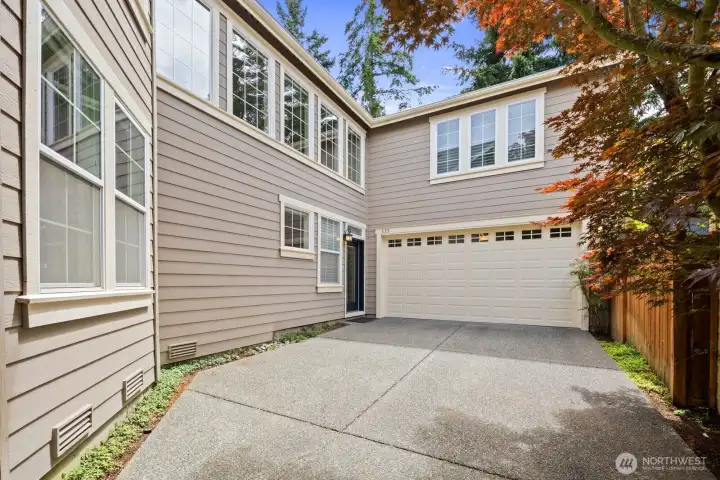 Spacious Driveway with side home entrance & 2 car garage Spacious Driveway with side home entrance & 2 car garage