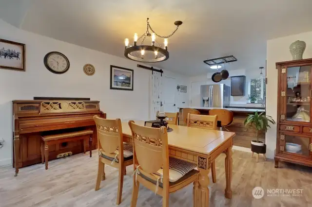 Dining area with additional seating at kitchen island
