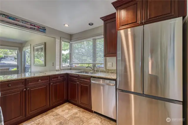 Tile floors complete the kitchen. Refrigerator stays with the home.