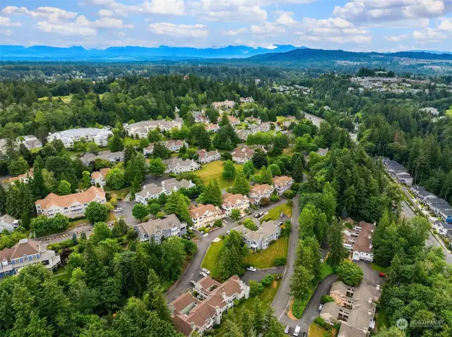 Looking South over the larger Providence Point community towards the main gate. In the distance you can see the Cascade Mountains, which offer great hiking, camping, and snow sports opportunities. Issaquah is ideally situated less than an hour from Snoqualmie Pass and less than an hour to Seattle.