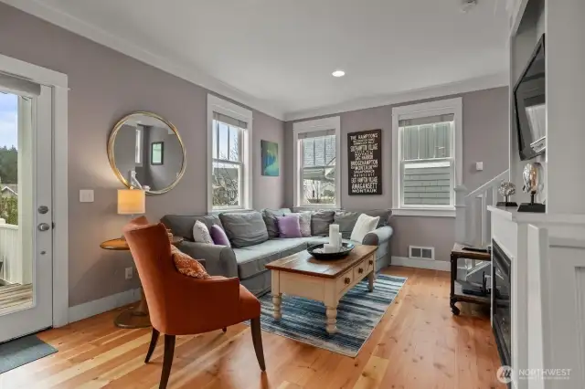 The sectional sofa is perfectly tucked into the corner to maximize seating.  There is a propane fireplace to keep you warm and built in spot for the entertainment center.