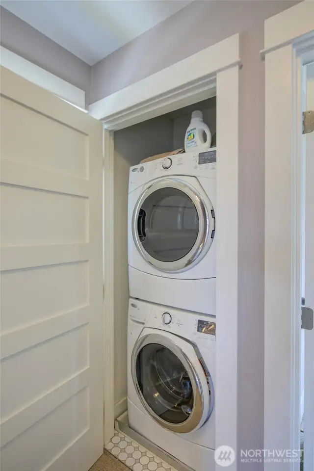 The laundry closet is functional and great for long or short stays at the beach!