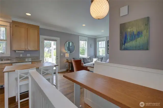 The living space is full of light and you'll love dining and playing games at this built in booth!