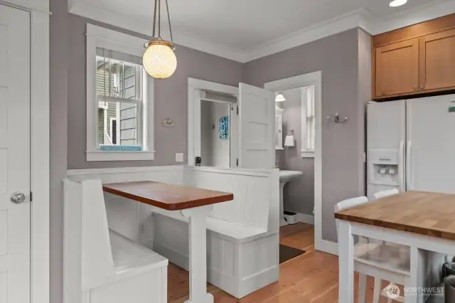 The island offers additional prep space and two extra places to sit. The floors were just refinished right after this photo was taken.