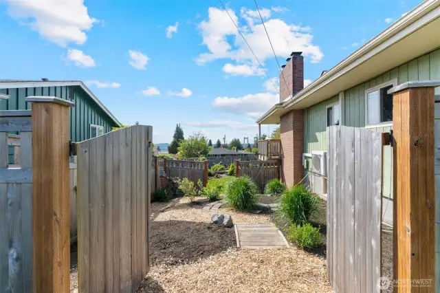 Side yard is fenced off to protect the garden from pups and predators. Ready for all of your spring planting!