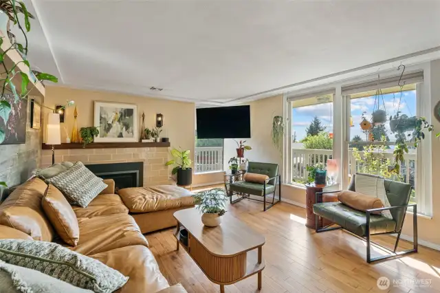 Bright and airy living space with gas fireplace