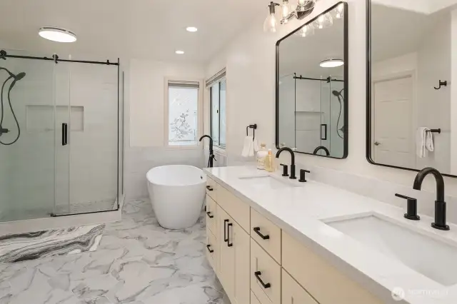 Wow! A recently remodeled 5-piece primary bathroom, designed for ultimate luxury and comfort.
