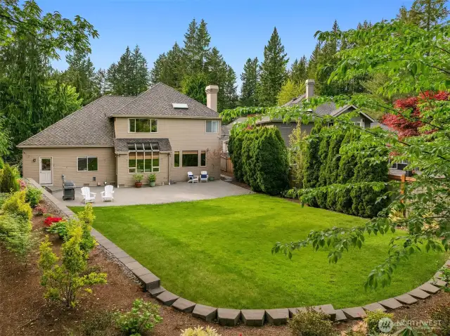Over $80K has been invested to transform this yard into a stunning landscaped oasis!