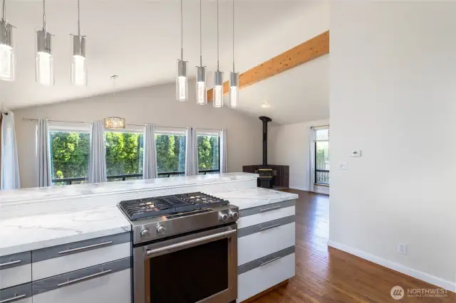 The angles, the open space, the vaulted ceiling, the wooden beam in the ceiling. It all makes this house an incredible home.