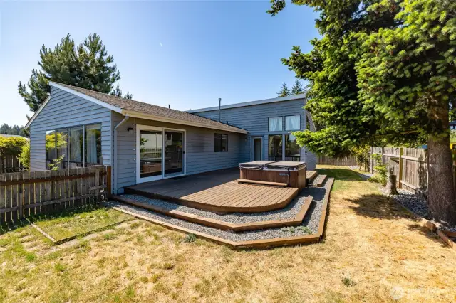 Looking at the home from the NE corner. Plenty of space for gardening, relaxing on the deck, soaking in the hot tub after a dreamy day of living in Shelter Bay.