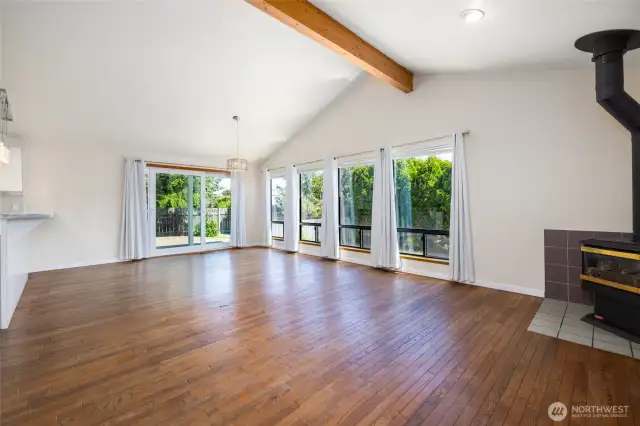 Vaulted ceiling, propane free-standing stove for the cozier NW seasons, and all that SUN!