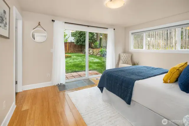 Primary suite w/slider to rear yard