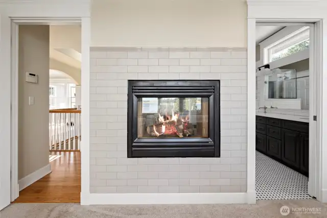 Two sided fireplace so you can enjoy in the bedroom and bathroom.