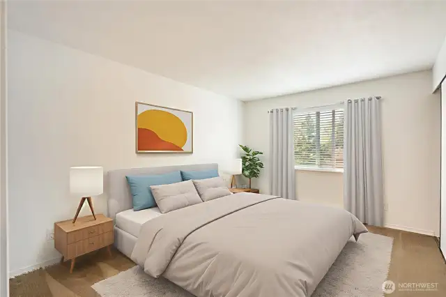 Primary bedroom spacious with large. double closet. Virtually staged
