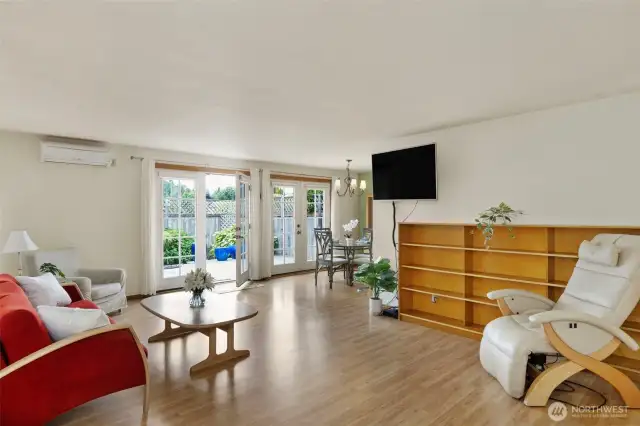 Living room with french door out to deck and back yard