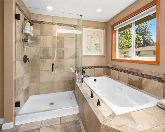 large soaking tub in primary bathroom