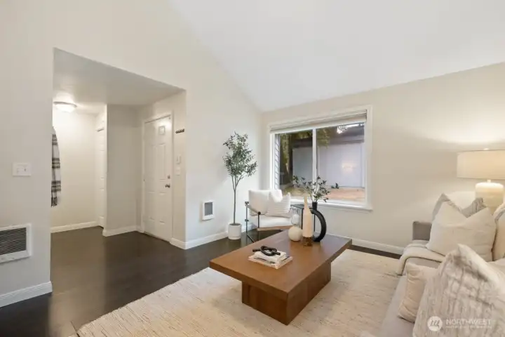 Freshly painted with manufactured wood flooring.