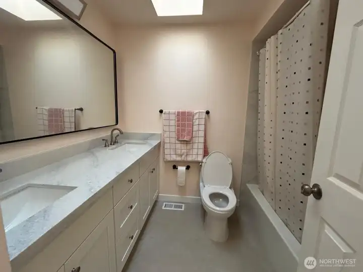 Second bathroom with new cabinet