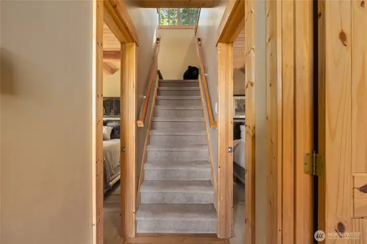 Stairs lead to upper bonus room/loft area.