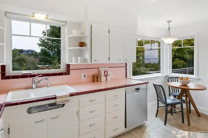 Vintage kitchen circa 1953. Freshly painted, updated appliances and dining nook.
