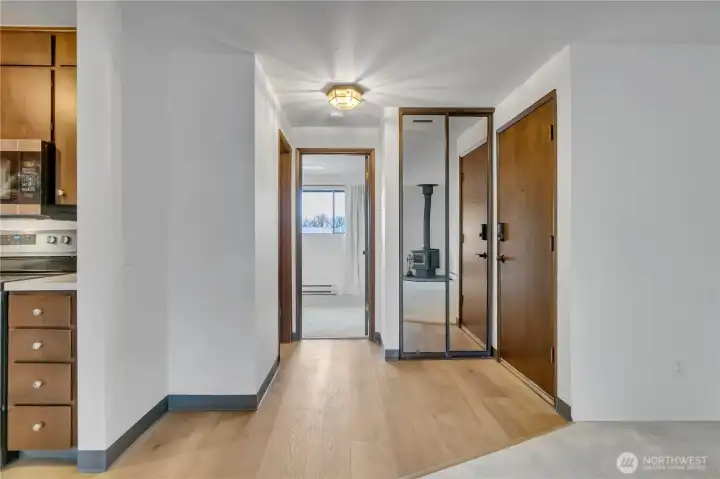 Entry has new LVP flooring that open to the kitchen and bathroom, too!