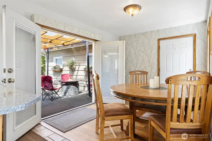 ~Dining Room with Custom Bamboo Flooring ~ When the Sun shines on the Wallpaper in the Dining Room & Kitchen, it looks like the Morning Dew on the Branches~