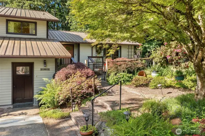 A lovely, sylvan setting for this well-maintained, generous and gracious view home. Burton Hill is a premier location on Vashon Island.