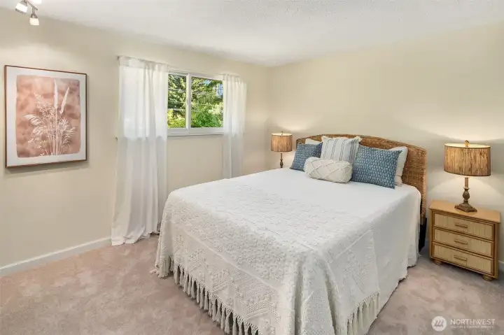 North facing bedroom with fresh carpet and paint.