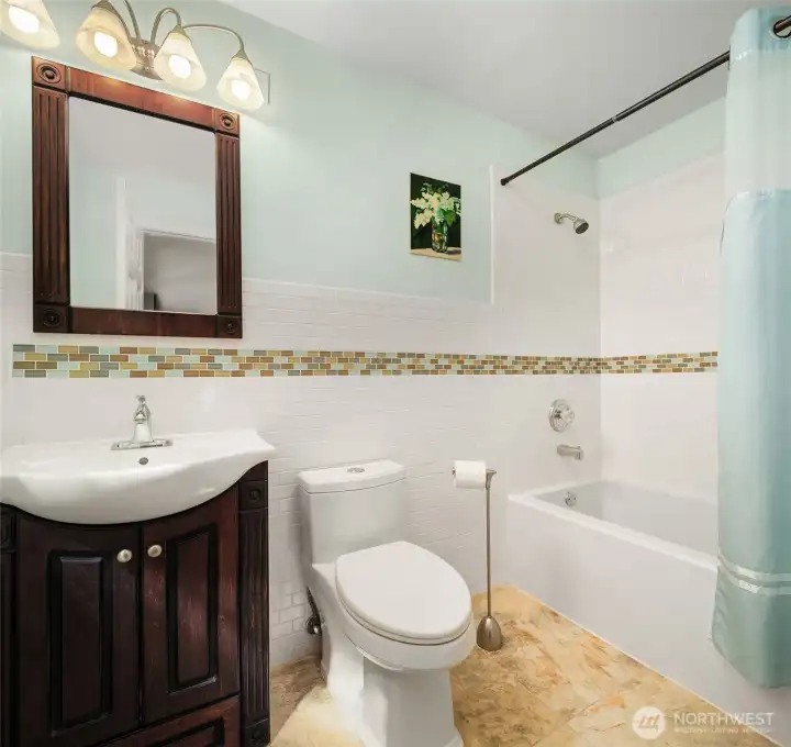 Full bath on lower level off rec room.