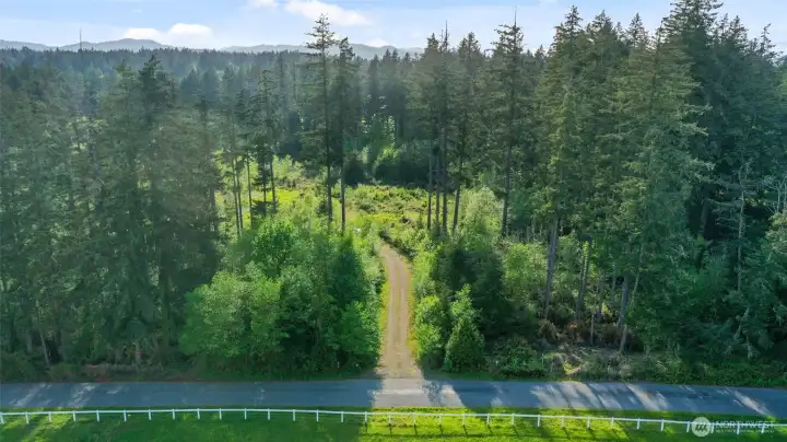 Shared access road between lots A 8511 & B 8505 Schirm RD NW. Ready for a quiet, rural lifestyle?