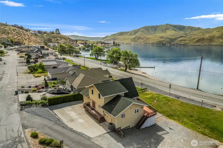 Rare opportunity in Chelan Hills — one of the very few homes offering direct lake access along with "I live on Lake Chelan" views.