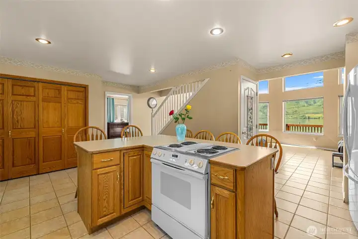 The kitchen has open sightlines to the great room and beautiful Lake Chelan views beyond.