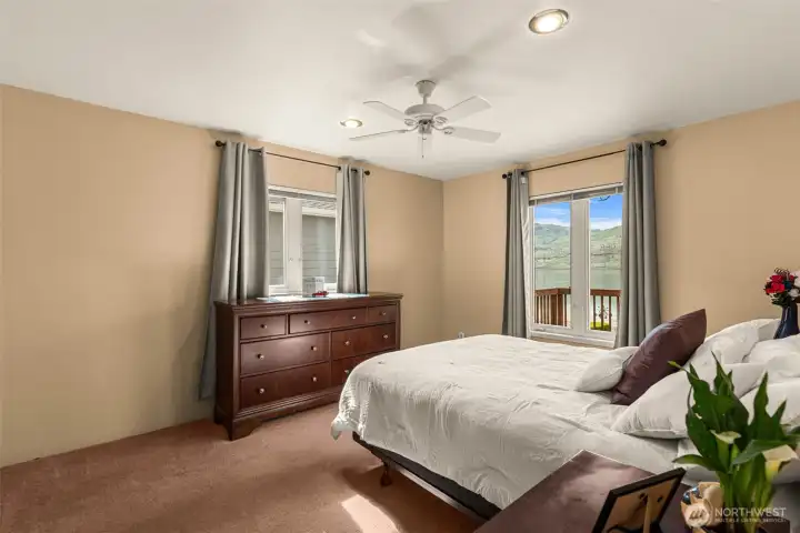 Wake up to beautiful Lake Chelan views from the spacious main-floor primary suite, offering comfort, privacy, and easy single-level living.
