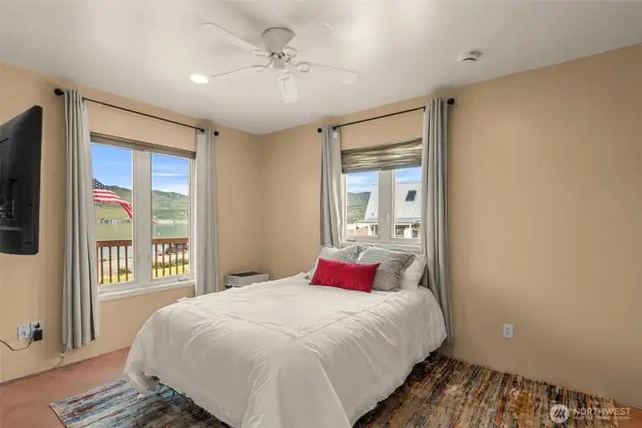 The guest bedroom suite on the main floor offers beautiful Lake Chelan views.