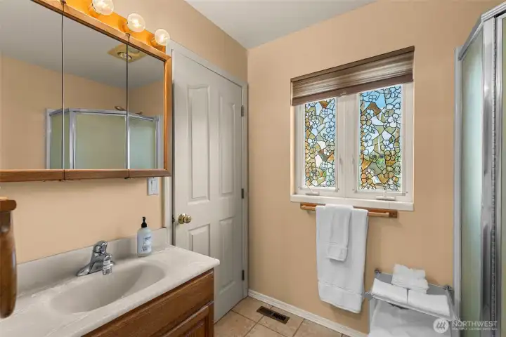 Main floor guest bedroom suite 3/4 bath
