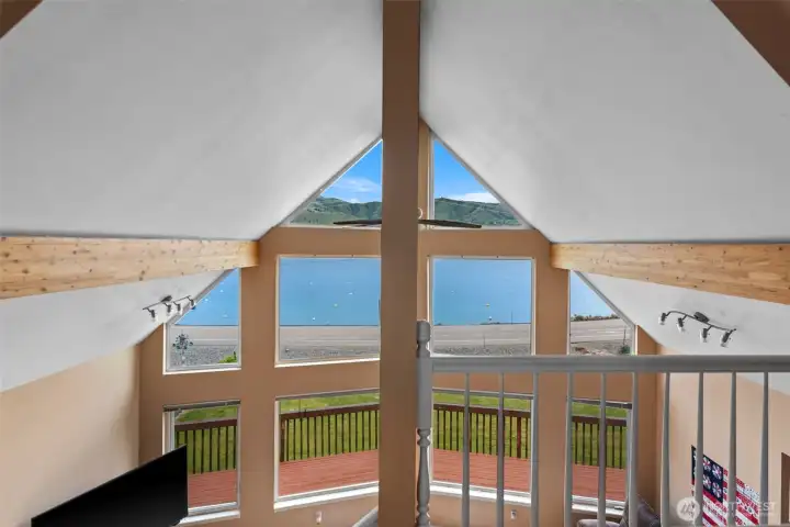 Nothing but beautiful views from this floor to ceiling window wall!