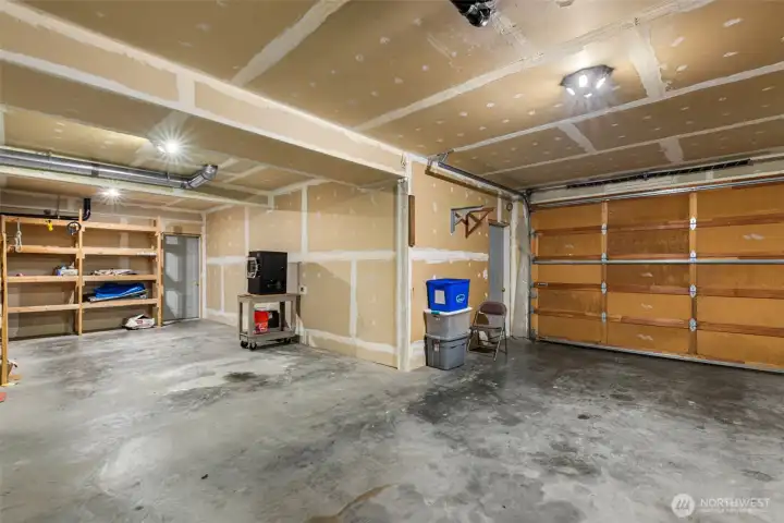 The 1 car garage door is accessed under the deck.  The owners used the large "L" portion to store their boat. That space could also be converted to additional living space. Perhaps a game room, home theatre, home gym, or...?