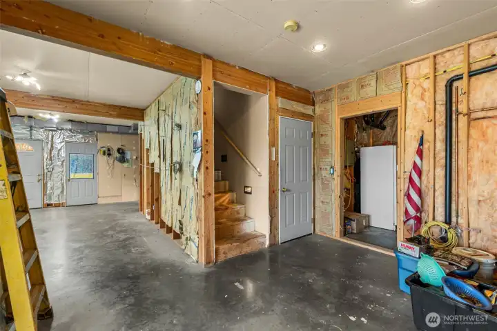 A kitchenette and 3/4 bath was envisioned, and some wiring and plumbing is in place.