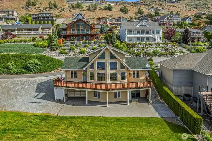 Rare for Lake Chelan — abundant parking for guests, boats, and toys, plus a spacious level yard perfect for lawn games, entertaining, and relaxed outdoor living.