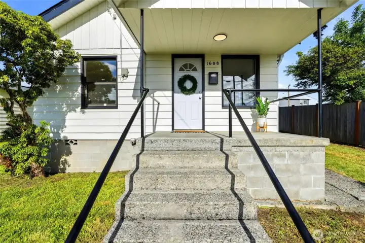 Inviting entry with covered front porch. Inviting entry with covered front porch.