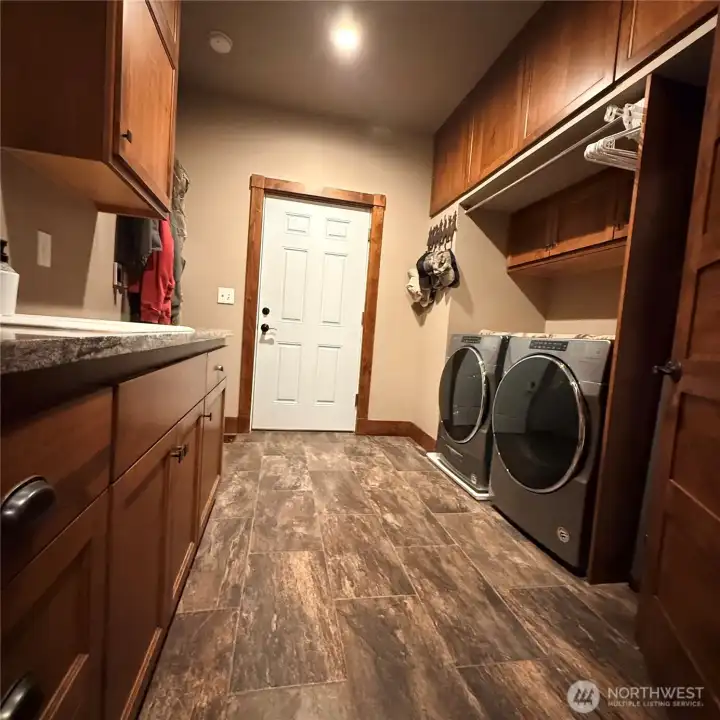 laundry with sink and garage door